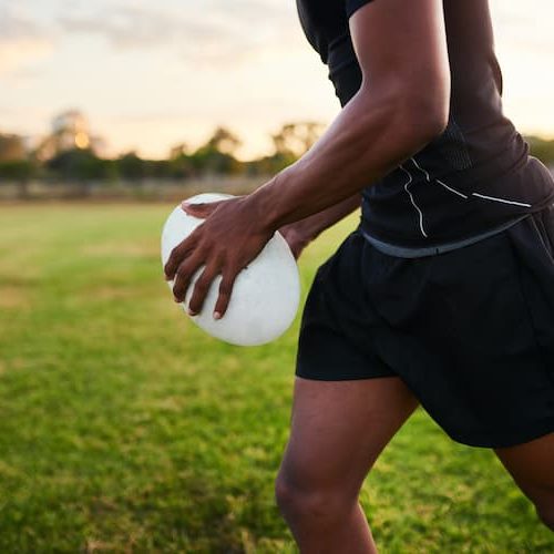 athlete-runs-with-a-ball-on-green-field-2026-03-25-03-17-51-utc (1)