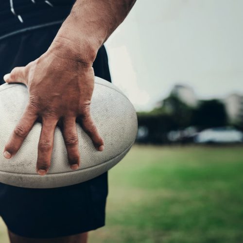 man-holding-rugby-ball-ready-to-play-2026-03-25-06-55-10-utc (1)