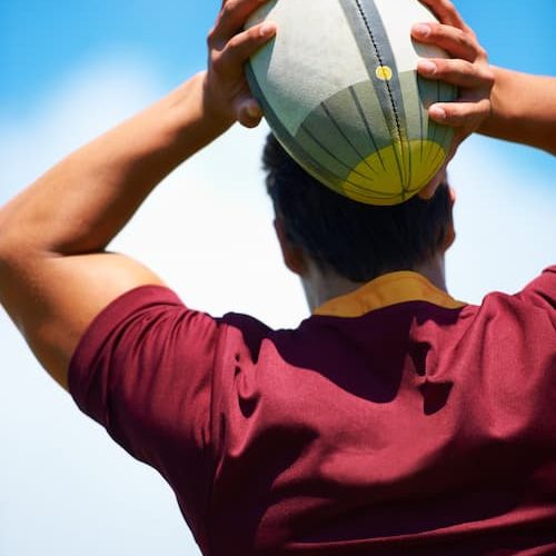 rugby-player-with-ball-outdoors-against-blue-sky-2026-01-09-09-44-42-utc (1)